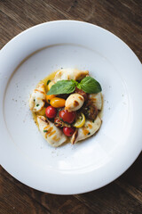 Stylish serving of food in the restaurant. Serving. Waiter