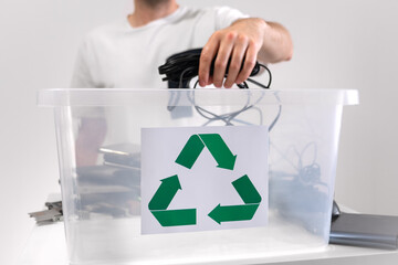 Hazardous E-Waste Recycling. Household electrical and scrapped electronic devices in recycle box....