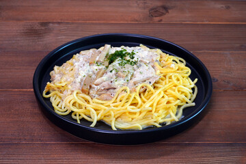 Spaghetti with Truffle mushroom cream sauce and chicken breast