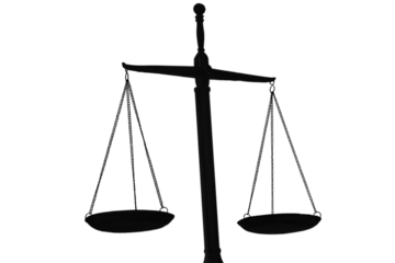 Law scales on table background. Symbol of justice