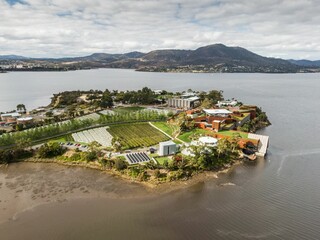 Beautiful drone view over the Mona Art Museum Hobart in Tasmania by water, Australia