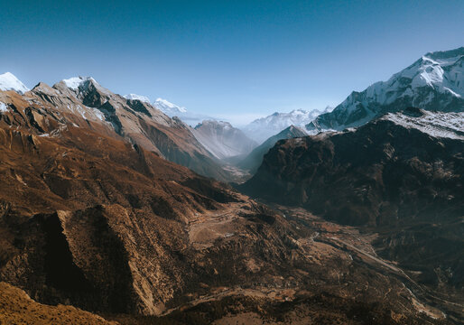 Aerial view of Ngawal village with Humde Airport (right side) with Swargadwari Danda in the background. 
 From trail to Kicho Tal (Ice Lake) (4,600m), Munchi, Annapurna Circuit Trek, Nepal