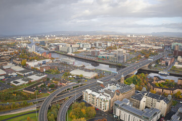 Fototapeta na wymiar Aerial view of Glasgow showing the Kingston Bridge over the River Clyde and M8, M74 Motorway