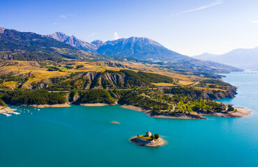 Panoramic scenic view of Serre-Poncon Lake and Alps in southeast France