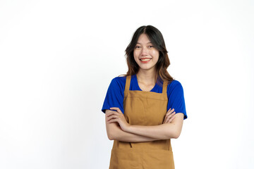 Fototapeta premium Cheerful young pretty asian woman blue t-shirt and apron coffee owner isolated on white background. looking camera