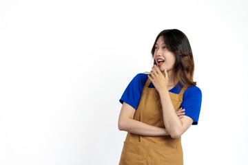 Cheerful young pretty asian woman blue t-shirt and apron coffee owner isolated on white background.