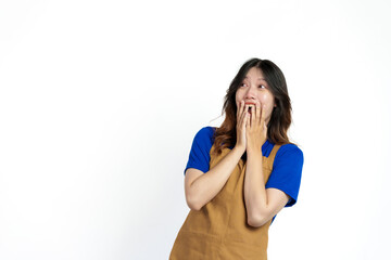 Cheerful young pretty asian woman blue t-shirt and apron coffee owner isolated on white background.