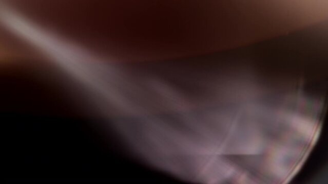 Light organic leaks effect background animation stock footage Lens light leaks flashing around making an elegant abstract background animation Classic Light Leak in 4k drag and drop editing software