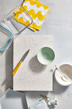 white board with bowls and yellow napkin