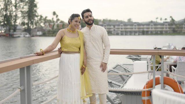 Indian Couple In Haldi Outfit For Wedding Ceremony - wide