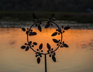 whirly gig at sunset
