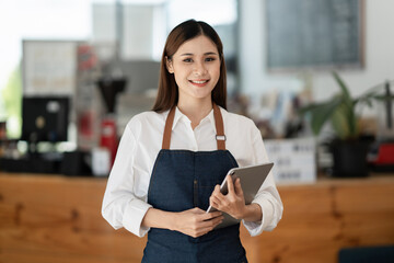 Successful small business owner sme beauty girl stand at her cafe