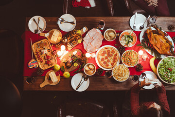Table served for Christmas dinner. Top view.