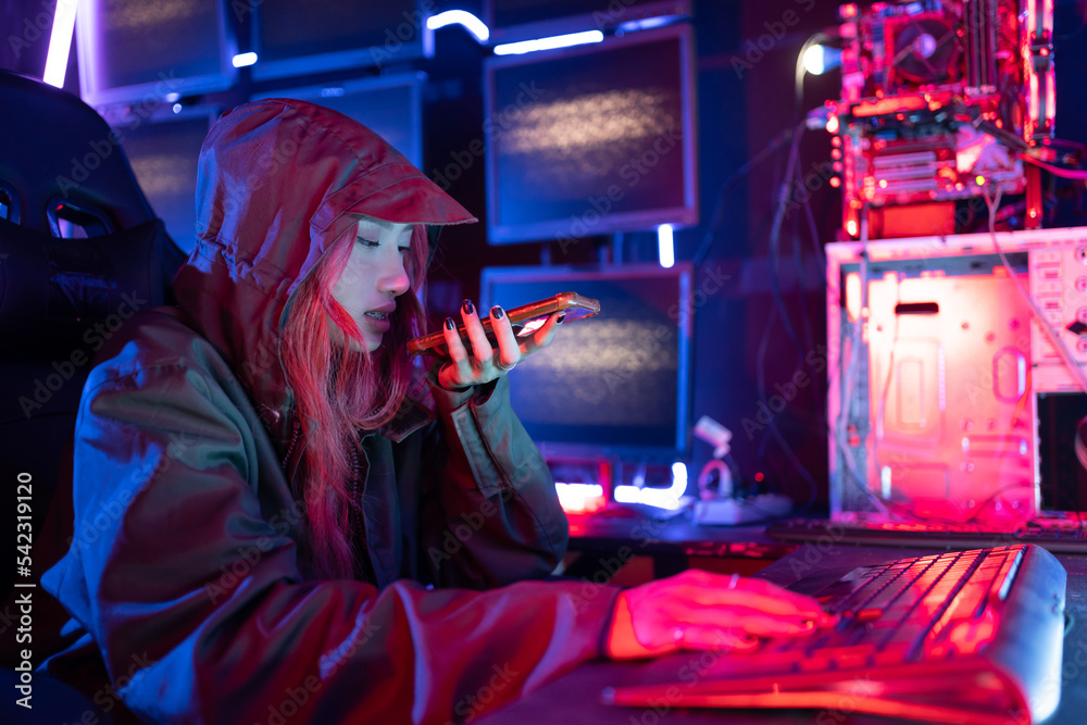 Fototapete Hack program concept. Professional woman hacker using keyboard send coding bad data and error into software computer online system and spreading to global stolen personal information.