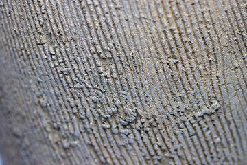 Tanegashima ware, traditional Japanese pottery, rustic Jomon-style striped porcelain surface.
