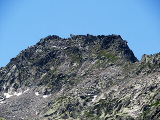 Rocky mountain peak Pizzo della Valletta (2726 m) in the massif of the Swiss Alps above the St. Gotthard Pass (Gotthardpass), Airolo - Canton of Ticino (Tessin), Switzerland (Schweiz)