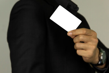 hand holding white card close up for white card concept design on white background.