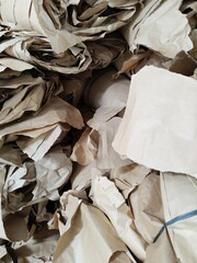 recyclable waste, consisting of piles of cardboard and plastic or aluminum plastic