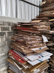 recyclable waste, consisting of piles of cardboard and plastic or aluminum plastic