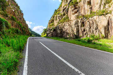 Empty asphalt road and mountain natural scenery