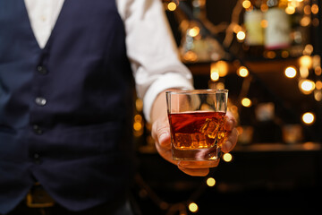 Bartender pouring Whiskey, on  bar,
