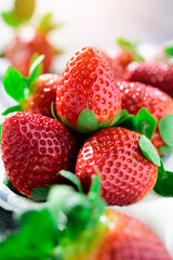 Fresh strawberry on wood background, top view, close up