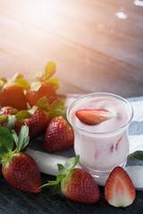 Healthy food of yogurt, Strawberry Yogurt,yogurt with fresh strawberry, wood background