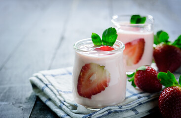 Healthy food of yogurt, Strawberry Yogurt,yogurt with fresh strawberry, wood background