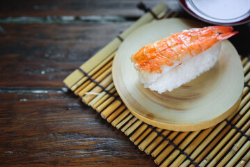 Sushi Set nigiri shrimp aon wood,top view,