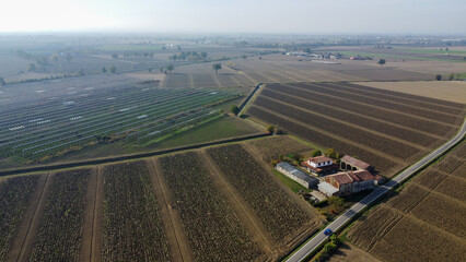 Rural landscape of cultivated fields and photovoltaic panels in Piacenza. Italy