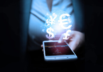 Business, finance and investment, forex trading, currency exchange, economic growth, stock market analysis concept. Using mobile phone checking stock market graph report via mobile apps