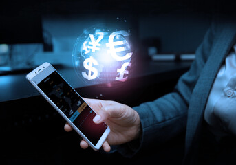 Business, finance and investment, forex trading, currency exchange, economic growth, stock market analysis concept. Using mobile phone checking stock market graph report via mobile apps