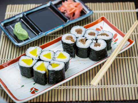Oshinko Radish and Pickles maki roll served with wasabi, soy sauce and vinegary ginger