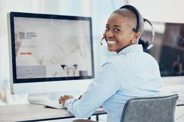 Customer support, call center and portrait of black woman at work on computer, sitting at desk and smile. Technology, telemarketing and consulting agent typing, working and busy on pc at crm company