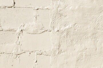 ベージュ色のコンクリート壁