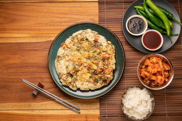 Korean pancake or Pajeon, Korean  dish made from egg and wheat flour with chili and chives vegetable.