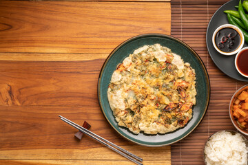 Korean pancake or Pajeon, Korean  dish made from egg and wheat flour with chili and chives vegetable.