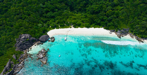 Aerial view of white sand beach tropical with seashore as the island in a coral reef ,blue and...