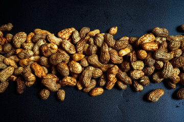 Peanut in a shell texture with copy space. food background of peanuts