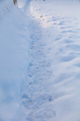 Footpath in the snow as a background.
