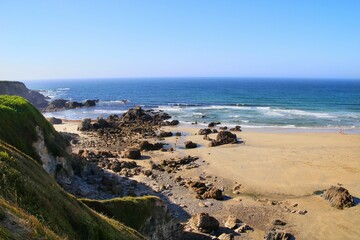 Scenic view of the rock formations and sea-cliffs on Penarronda Sandy Beach, Asturias, Spain