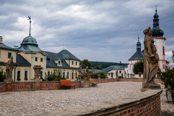 Manetin, West Bohemia, Czech Republic, 23 July 2022: Baroque mansion, castle or chateau with garden...