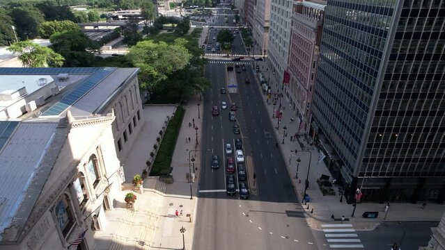 Flying Above Michigan Avenue and The Art Institute of Chicago Building, Drone Aerial View of Evening Traffic