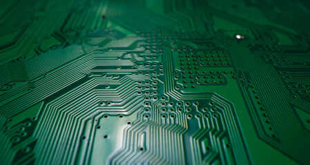 Electronic circuit board with semiconductors chip. Electronic motherboard card. Circuitry and close-up on electronics. Background of electronics on board electrical circuits, technology texture.