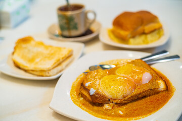 Eggs, toast with Kaya and Butter and coffee in Kuala Lumpur