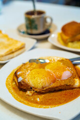 Eggs, toast with Kaya and Butter and coffee in Kuala Lumpur