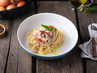 Homemade Carbonara pasta Spaghetti wooden rustic background