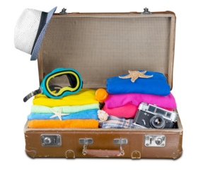 Tourist bag with clothes and summer vacation symbols