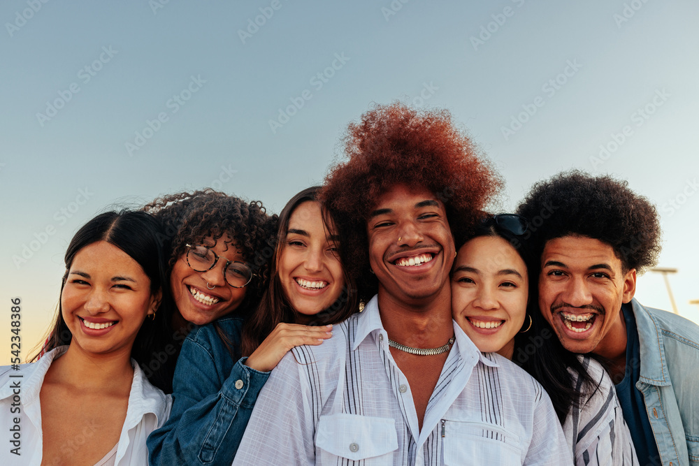 Wall mural diverse friends outdoors portrait.