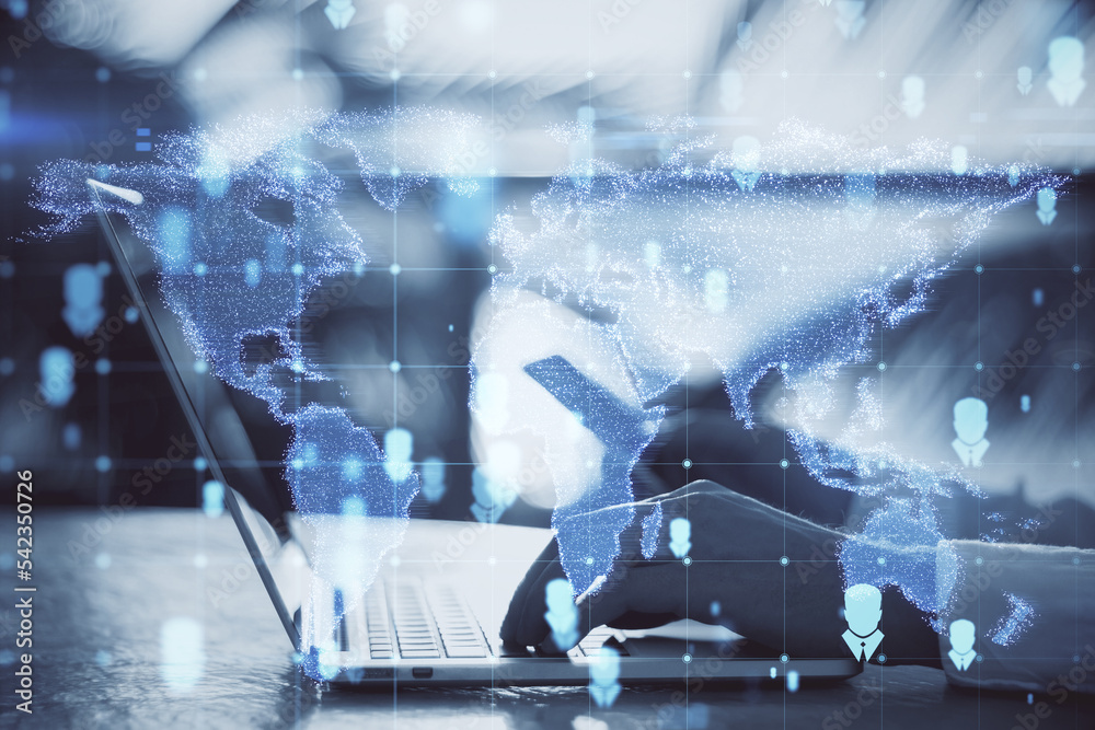 Poster close up of hands using laptop and cellphone with abstract glowing map hologram on blurry background